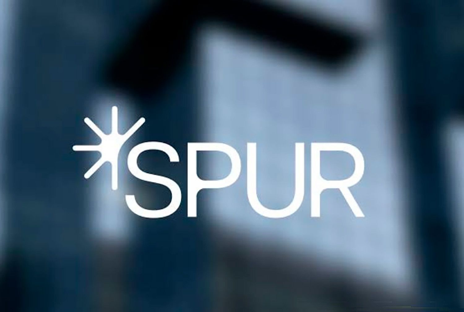 Logotipo de SPUR en letras blancas sobre un fondo azul desenfocado