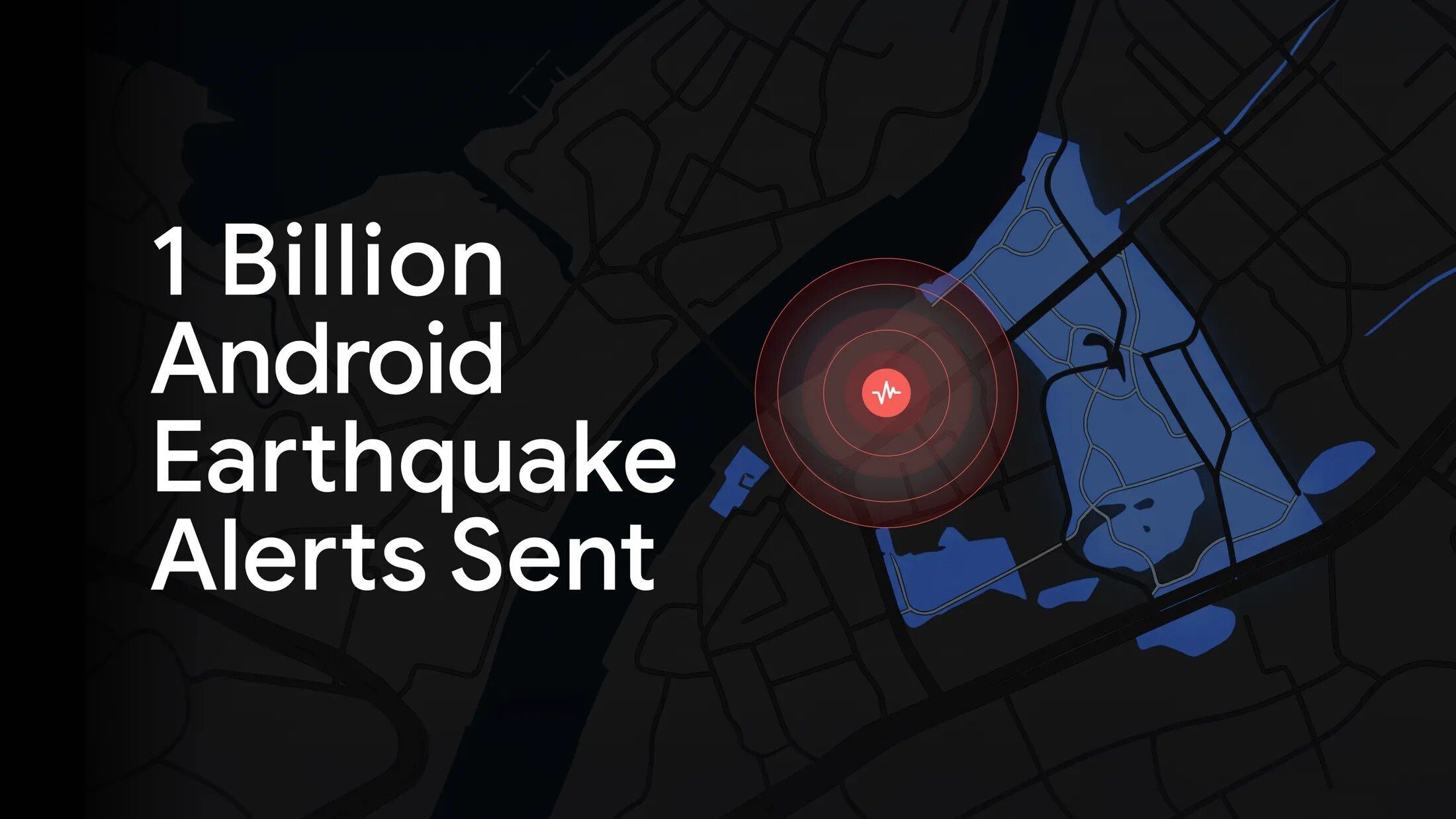 Mapa urbano oscuro con un círculo rojo que marca un sismo detectado y el texto en inglés "1 Billion Android Earthquake Alerts Sent"